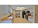 Bright kitchen features stainless steel appliances, white cabinets, and a closet at 1 Fox Hollow Dr, Ormond Beach, FL 32174