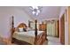 Relaxing main bedroom with a vaulted ceiling, skylight, and traditional furniture at 1 Fox Hollow Dr, Ormond Beach, FL 32174