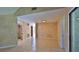 Spacious room with unique archway feature and sliding door access at 1 Fox Hollow Dr, Ormond Beach, FL 32174