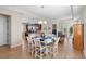 Open dining area flowing to the kitchen and living space, great for entertaining at 1088 Avery Meadows Way, Deland, FL 32724