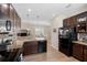 Beautiful kitchen with wooden cabinets, stainless appliances, and granite counters at 1088 Avery Meadows Way, Deland, FL 32724
