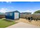 This backyard features a shed, outdoor seating, and a wooden deck perfect for entertaining at 111 Claire Ter, Daytona Beach, FL 32118
