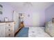 Bedroom showcases hardwood floors, closet, and open doorway to living area at 111 Claire Ter, Daytona Beach, FL 32118