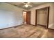 Bedroom with ceiling fan and closet has carpeted floors and neutral walls at 1167 Peachtree Rd, Daytona Beach, FL 32114