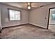 Bright bedroom with a ceiling fan and a window at 1167 Peachtree Rd, Daytona Beach, FL 32114