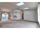 Inviting living room with access to the lanai through sliding glass doors at 1167 Peachtree Rd, Daytona Beach, FL 32114