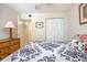 This bedroom offers lots of closet space with a view into an additional room at 120 Hibiscus Woods Ct # 2A, Deltona, FL 32725