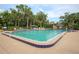 Take a dip in the sparkling community pool with ample seating and a nearby pool house at 120 Hibiscus Woods Ct # 2A, Deltona, FL 32725