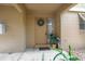 Charming front door with a wreath and decorative potted plants at 120 Hibiscus Woods Ct # 2A, Deltona, FL 32725