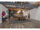 Open concept dining area with modern decor and wood ceiling beams at 125 Smyrna Dr, Debary, FL 32713