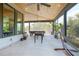 Spacious sunroom featuring a wood ceiling, recessed lighting, and multiple entertaining game options at 125 Smyrna Dr, Debary, FL 32713