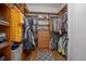 Large walk-in closet with custom shelving and organization system at 125 Smyrna Dr, Debary, FL 32713