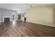 Spacious living room with modern fireplace and wood-look flooring at 1253 Bramley Ln, Deland, FL 32720