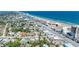 Expansive coastal view showcasing homes, beaches, and a vibrant cityscape along the shoreline at 130 Harrison Rd, Daytona Beach, FL 32118