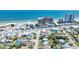 Panoramic aerial shot of a coastal town featuring a mix of residential areas, hotels, and beachfront properties at 130 Harrison Rd, Daytona Beach, FL 32118