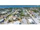 Scenic neighborhood view showcasing charming homes, lush greenery, and local businesses at 130 Harrison Rd, Daytona Beach, FL 32118