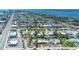 Extensive aerial view showcases a neighborhood by the beach, filled with cozy homes and lush greenery at 130 Harrison Rd, Daytona Beach, FL 32118