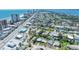 Expansive aerial perspective capturing a vibrant coastal community and a bustling beachside highway at 130 Harrison Rd, Daytona Beach, FL 32118
