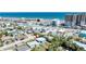 Expansive aerial perspective capturing a vibrant coastal community and a bustling beachside highway at 130 Harrison Rd, Daytona Beach, FL 32118