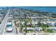 Extensive aerial view showcases a neighborhood by the beach, filled with cozy homes and lush greenery at 130 Harrison Rd, Daytona Beach, FL 32118