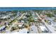 Scenic neighborhood view showcasing charming homes, lush greenery, and local businesses at 130 Harrison Rd, Daytona Beach, FL 32118