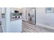 Bright kitchen with stainless steel appliances, white cabinets, and modern flooring at 130 Harrison Rd, Daytona Beach, FL 32118