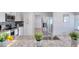 Modern kitchen with stainless steel appliances and granite countertops at 130 Harrison Rd, Daytona Beach, FL 32118