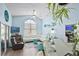 Bright living room features tile floors, lots of natural light, and open floor plan, perfect for entertaining at 13944 Huntwick Dr, Orlando, FL 32837