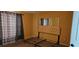 Vacant bedroom with neutral walls and installed mirror at 1408 E Normandy Blvd, Deltona, FL 32725