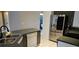 Well-equipped kitchen with a dual sink, dishwasher, and a stainless steel refrigerator at 1408 E Normandy Blvd, Deltona, FL 32725