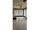 Bright sunroom with tiled floor and ceiling fan at 1408 E Normandy Blvd, Deltona, FL 32725