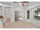 Bright open concept room with sliding doors to backyard and tile flooring throughout at 1439 Bent Oaks Blvd, Deland, FL 32724