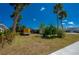 Spacious backyard offering mature trees and plenty of space for outdoor recreation and entertaining at 150 Nautical Dr, South Daytona, FL 32119