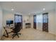 This bedroom features tiled floors, and is currently being used as an office space at 150 Nautical Dr, South Daytona, FL 32119