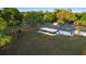 Expansive backyard featuring a covered patio and a spacious grassy area at 1560 S Pearl St, Deland, FL 32720