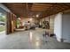 Interior of outbuilding has concrete floors and plenty of room for storage at 1560 S Pearl St, Deland, FL 32720