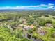 Aerial view of waterfront homes surrounded by lush green landscaping at 1578 Stone Trl, Deltona, FL 32725