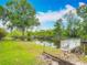 Backyard view features a wooden pier extending to the waterfront at 1578 Stone Trl, Deltona, FL 32725