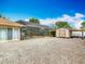 Property with a screened pool, gravel backyard and storage shed with covered parking area at 1578 Stone Trl, Deltona, FL 32725