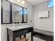 Bathroom features a granite countertop, tiled shower, and a leather bench at 1578 Stone Trl, Deltona, FL 32725