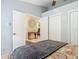 Bedroom featuring doorways, closet, and patterned bedding at 1578 Stone Trl, Deltona, FL 32725