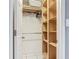 Walk-in closet featuring built-in shelving and hanging rods for optimal organization at 1578 Stone Trl, Deltona, FL 32725