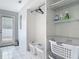 Storage area featuring an organized closet with shelving and baskets at 1578 Stone Trl, Deltona, FL 32725