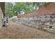 The terraced backyard and privacy fence offer a beautiful and secluded outdoor space at 1933 Oak Estates Dr, Orange City, FL 32763