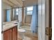 Bathroom featuring a bathtub, shower, and vanity, perfect for daily routines at 1933 Oak Estates Dr, Orange City, FL 32763
