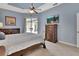 Comfortable main bedroom offering tiled floors and access to a private lanai at 1933 Oak Estates Dr, Orange City, FL 32763