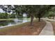 Enjoy a relaxing walk around this beautiful pond with fountains and sidewalks at 1933 Oak Estates Dr, Orange City, FL 32763