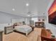 Comfortable main bedroom with a ceiling fan, wood-look flooring, and neutral decor at 1941 Jungle Rd, New Smyrna Beach, FL 32168