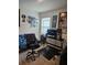 Functional bedroom with a desk, chair, and window, perfect for work or study at 209 Meghan Cir, Deland, FL 32724
