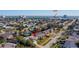 Aerial view of the property in a residential neighborhood near A1A and buildings by the ocean at 219 Lynnhurst Dr, Ormond Beach, FL 32176